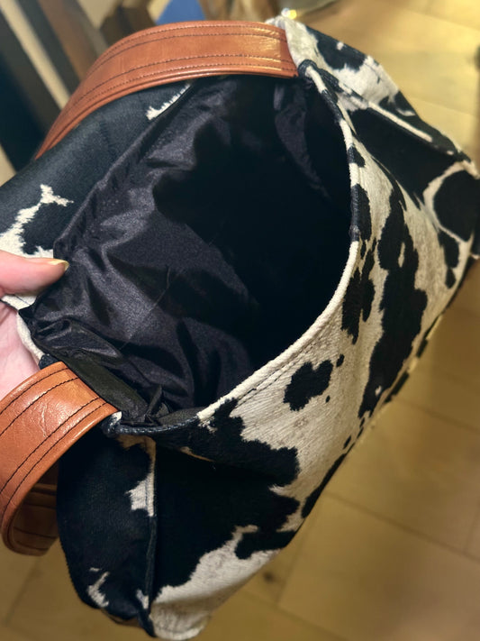 Cow print purse with vegan leather strap
