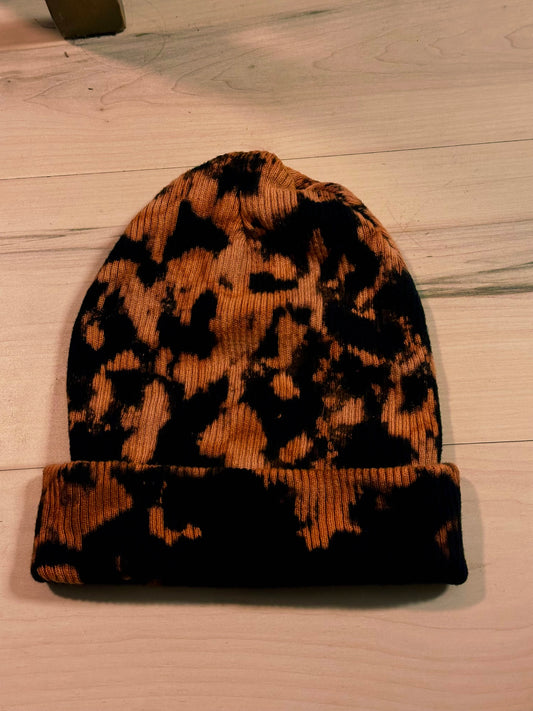 Bleach dyed black and orange beanie hat